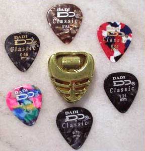 Spring-Loaded Pick Holders with Picks
